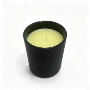 Citronella-scented candle in matte-black glass jar